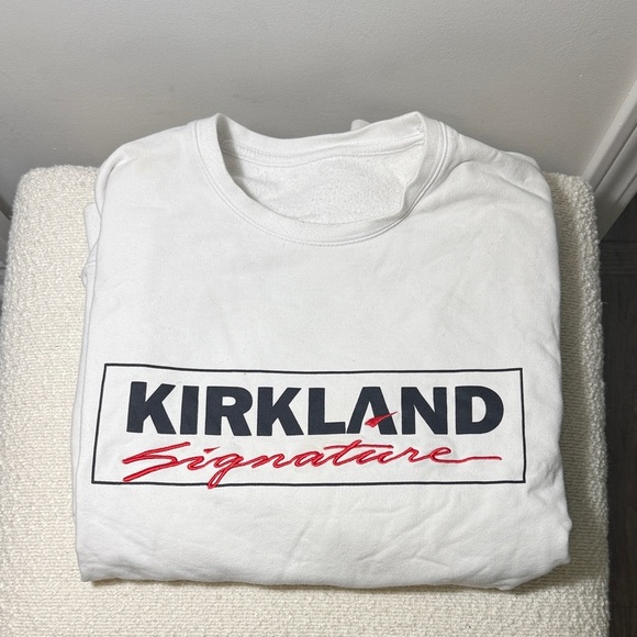 Kirkland Signature Sweaters - Kirkland Signature White crew neck sweater with Red and Black Logo